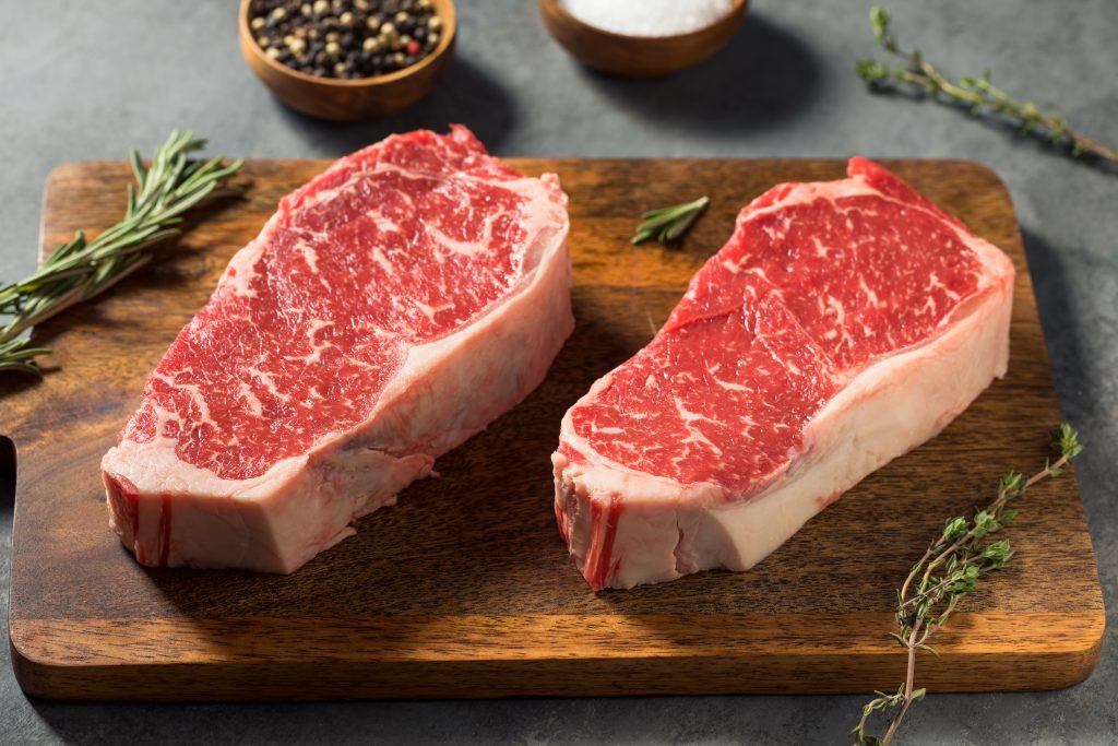Raw Red Organic New York Strip Steak Ready to Cook